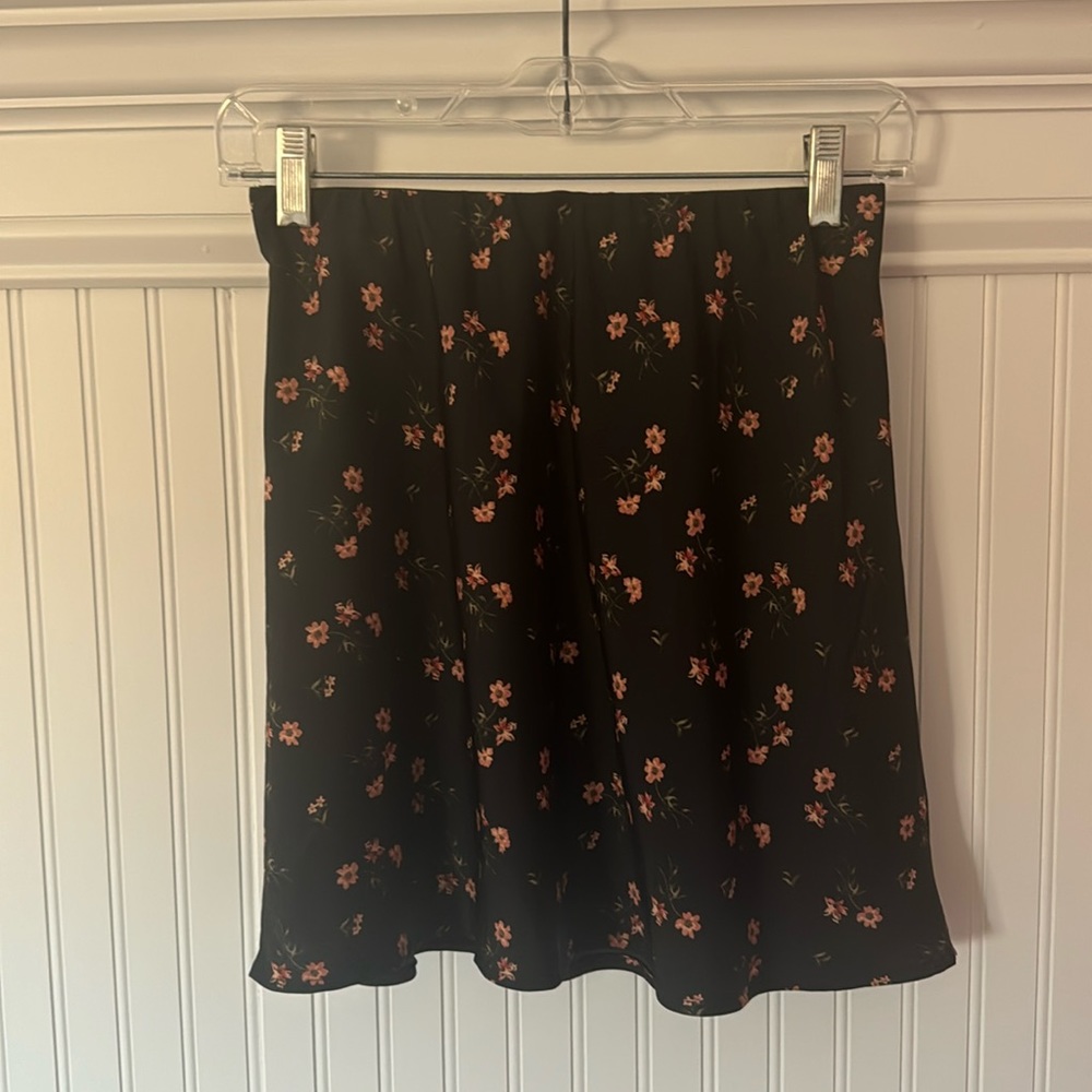 Black floral mini skirt